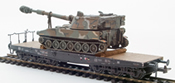 USA Camoflaged M109 A2 howitzer loaded on a six axle DB flat car 